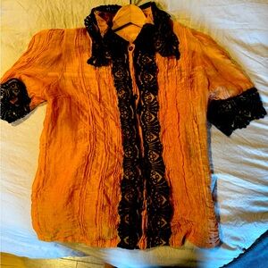 Beautiful cotton and lace blouse. So pretty with twice.